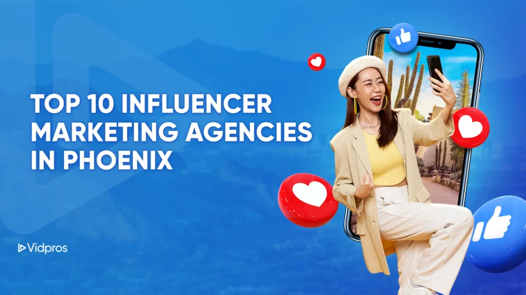 A smiling woman poses with a smartphone, surrounded by social media icons against a blue backdrop. The text highlights the Top 10 Influencer Marketing Agencies in Phoenix. Vidpros logo sits in the corner, marking excellence in influencer strategies.